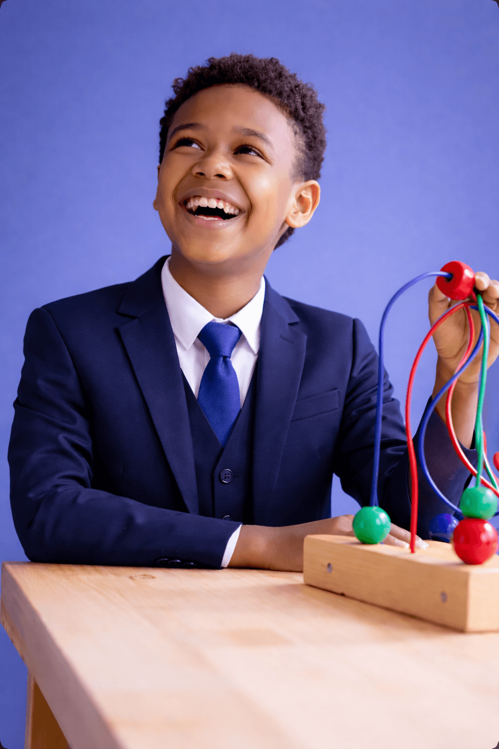 Student boy with toy